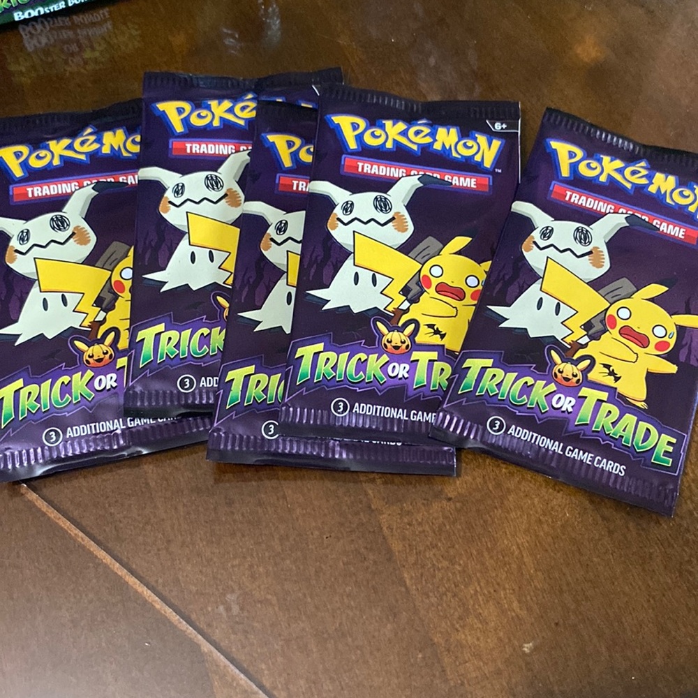 Pokémon trading cards, will receive 5 packets with 3 cards inside each packet